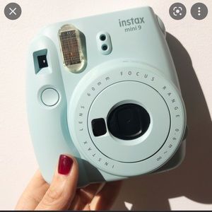 Blue fujifilm instax mini 9 film camera.